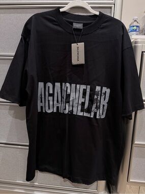Balenciaga Black Short-Sleeve Tee with Distressed White Logo